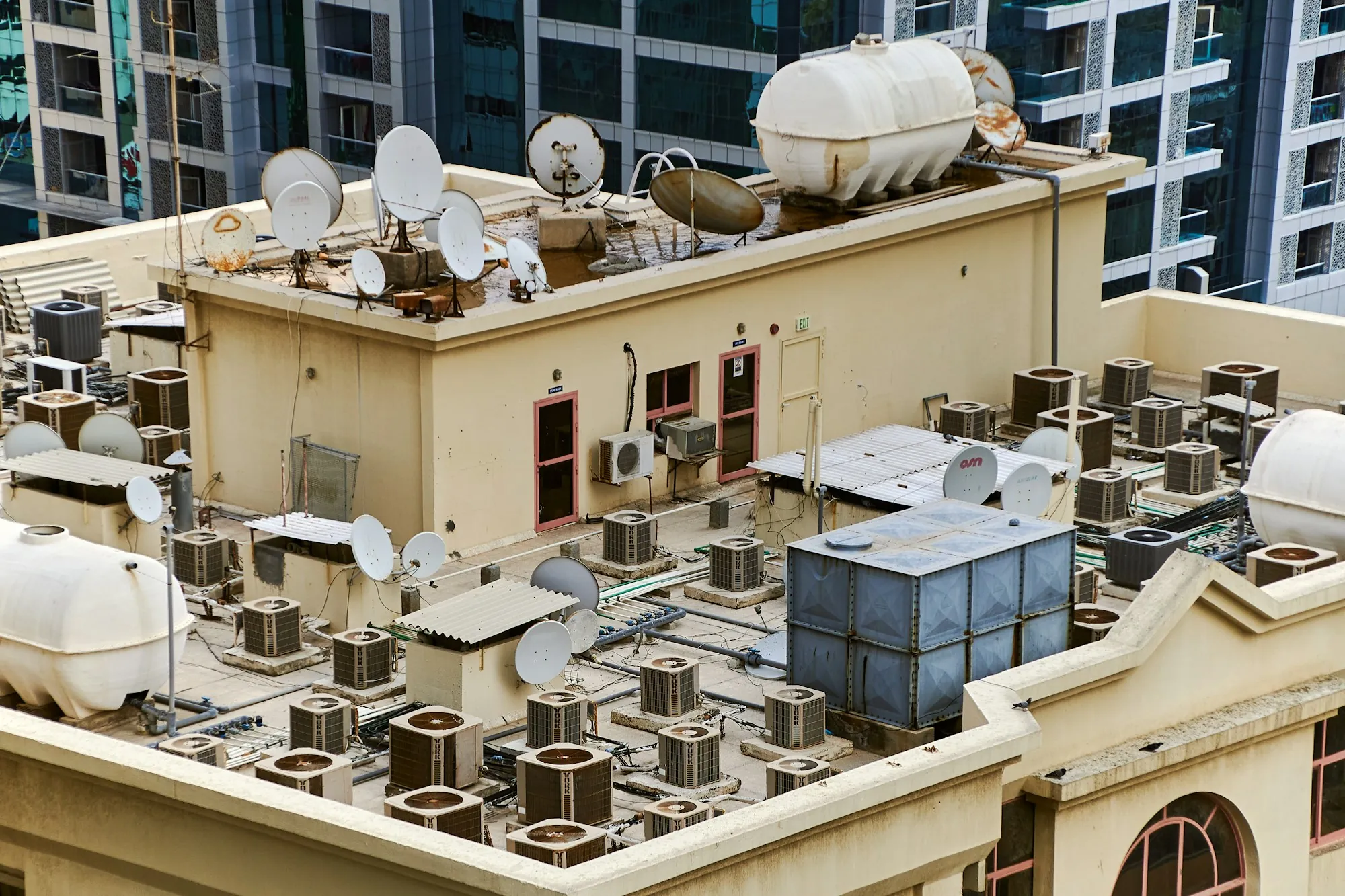 Rooftop crowded with air conditioning units