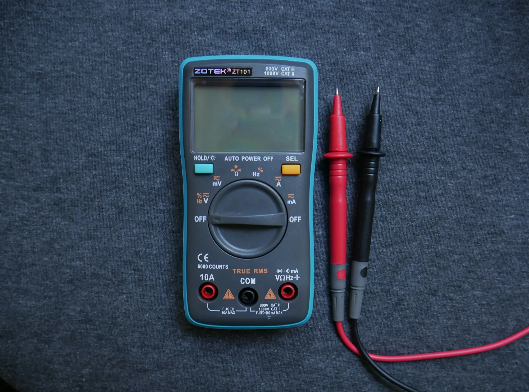 Digital multimeter with red and black test leads
